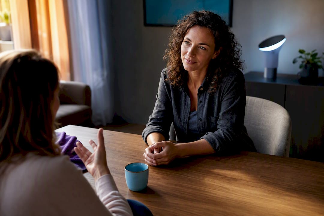 Two people practicing attentive empathetic listening