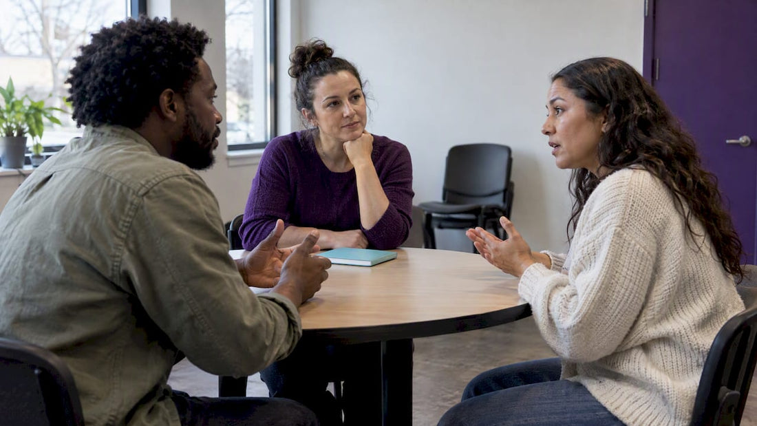 Neutral facilitator guiding a calm conversation