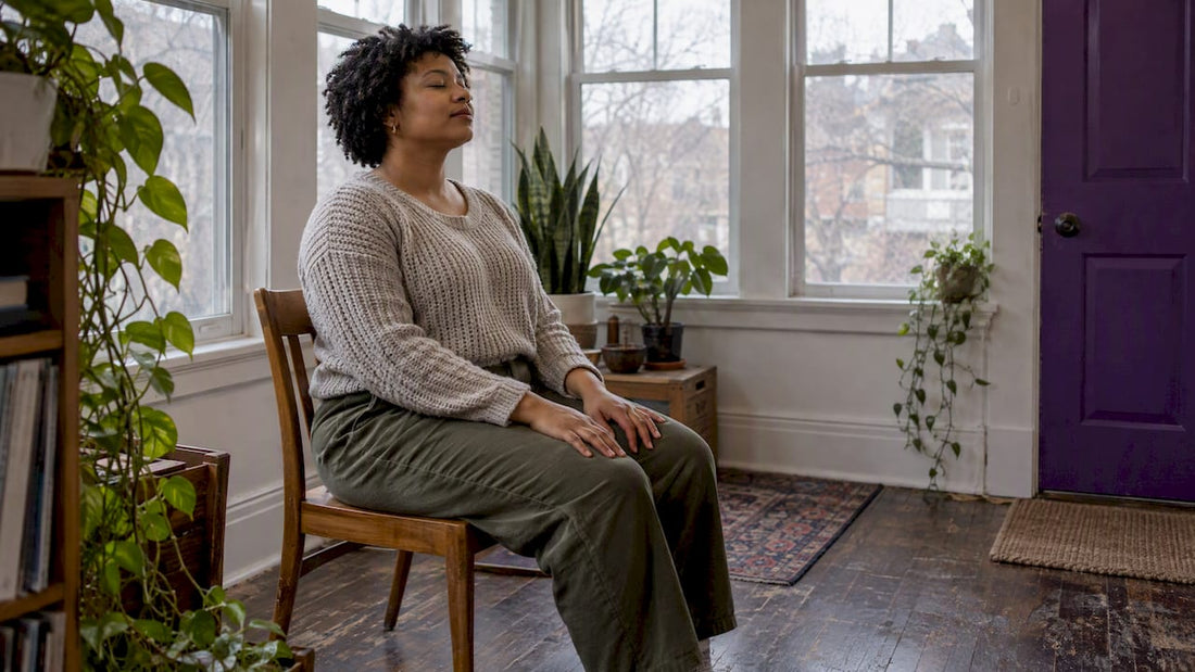 Woman pausing quietly for self-compassion